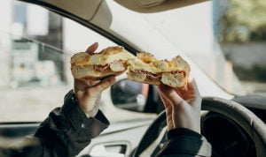 Read more about the article Don’t Eat And Drive: The Shocking Truth About Road-Based Snacking